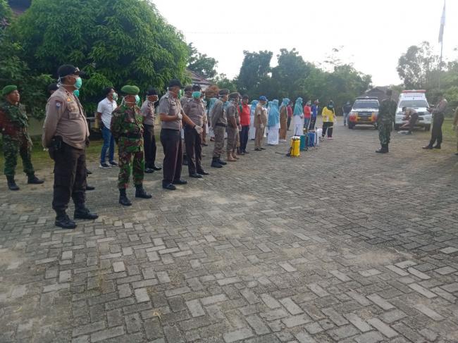 Cegah Covid 19, Koramil 12/XIII Koto Kpr dan instansi Lakukan Penyemprotan Disinfektan Secara Masal