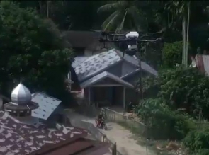Tim Polda Riau Lakukan Penyemprotan Desinfektan dengan Drone di Wilayah Pulau Terap Kuok