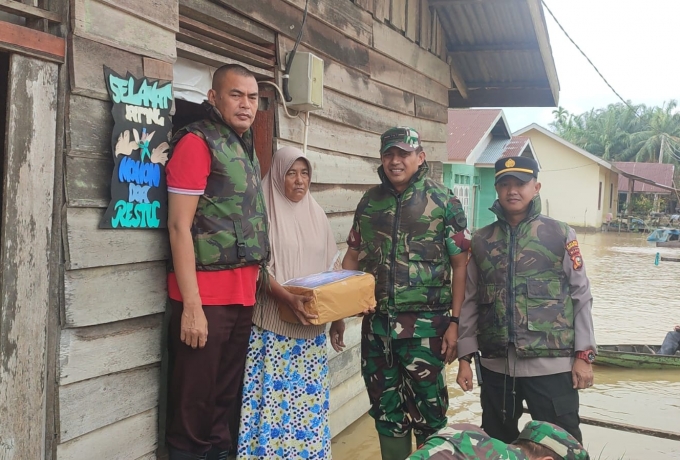 Letkol Inf Setiawan Hadi Nugroho Terjun Langsung ke Lokasi Banjir Kabupaten Rokan Hulu