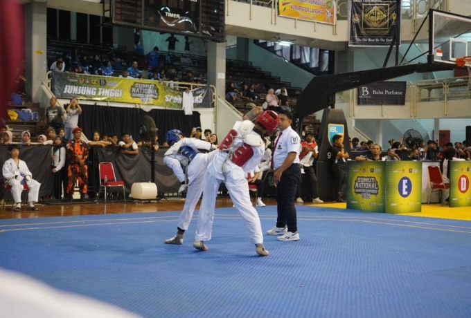 Bharada Sandi Morea Persembahkan Emas, Harumkan Nama Brimob Riau di Sumut Nasional Taekwondo