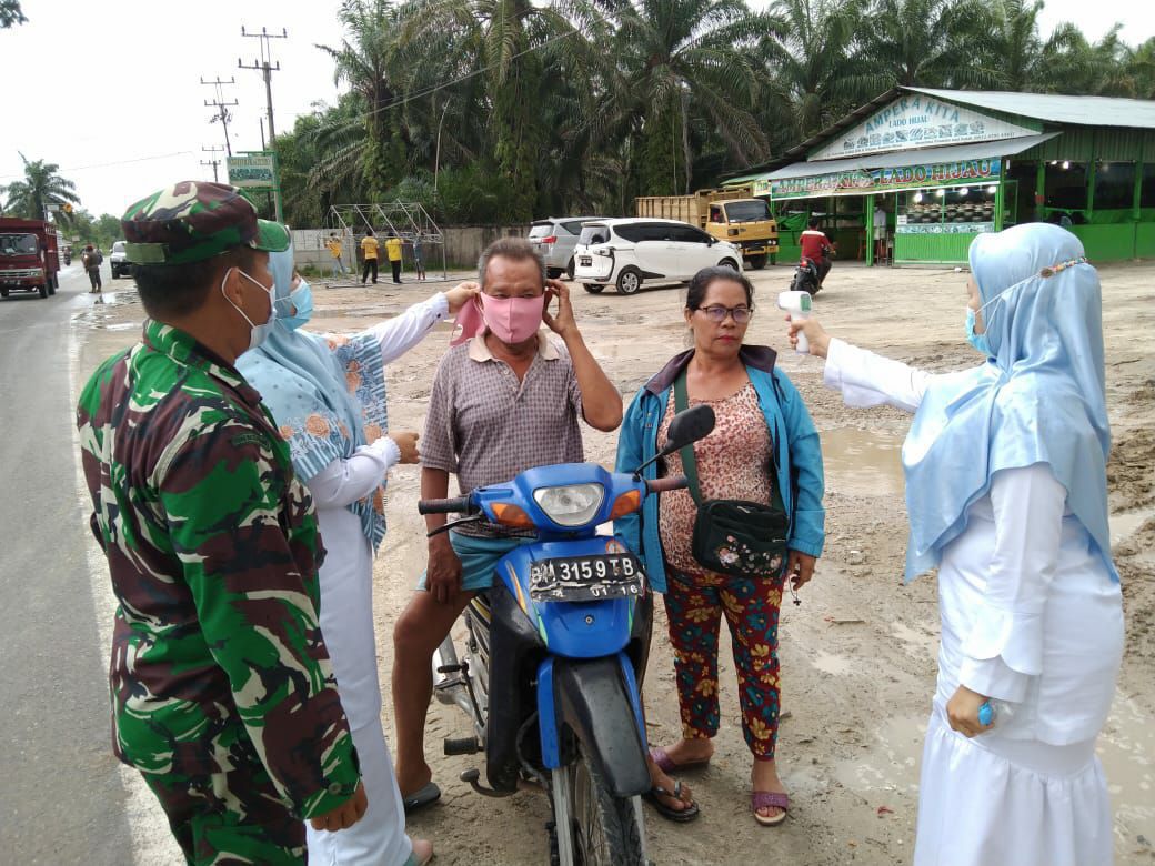 Sinergitas TNI POLRI, Babinsa Koramil 16/Tapung Bersama Bhabinkamtibmas Pantau Pos PSBM