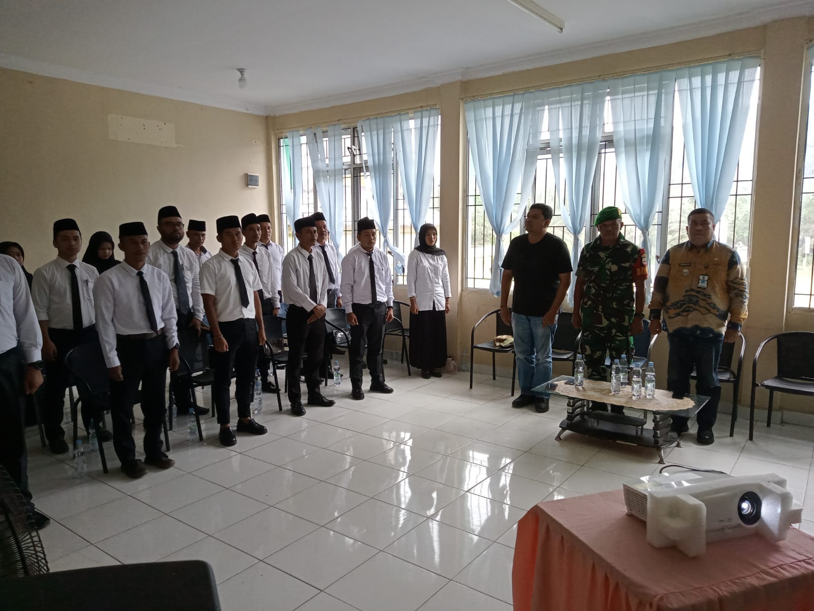 Babinsa mewakili Danramil 12/XIII Koto Kampar Turut Menghadiri Acara Pelantikan Anggota PPS 