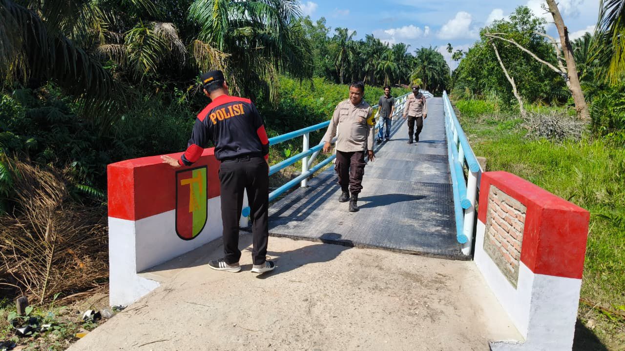69 Jembatan Tuntas, Brimob Polda Riau berikan akses masyarakat kian mudah dan aman