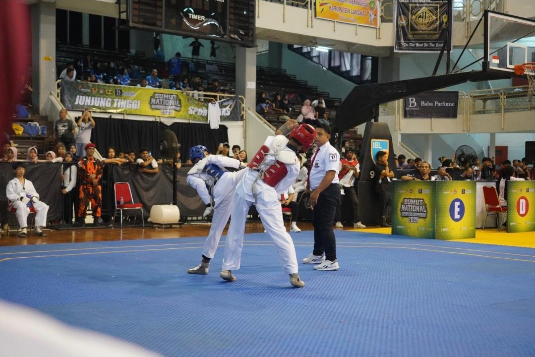 Bharada Sandi Morea Persembahkan Emas, Harumkan Nama Brimob Riau di Sumut Nasional Taekwondo