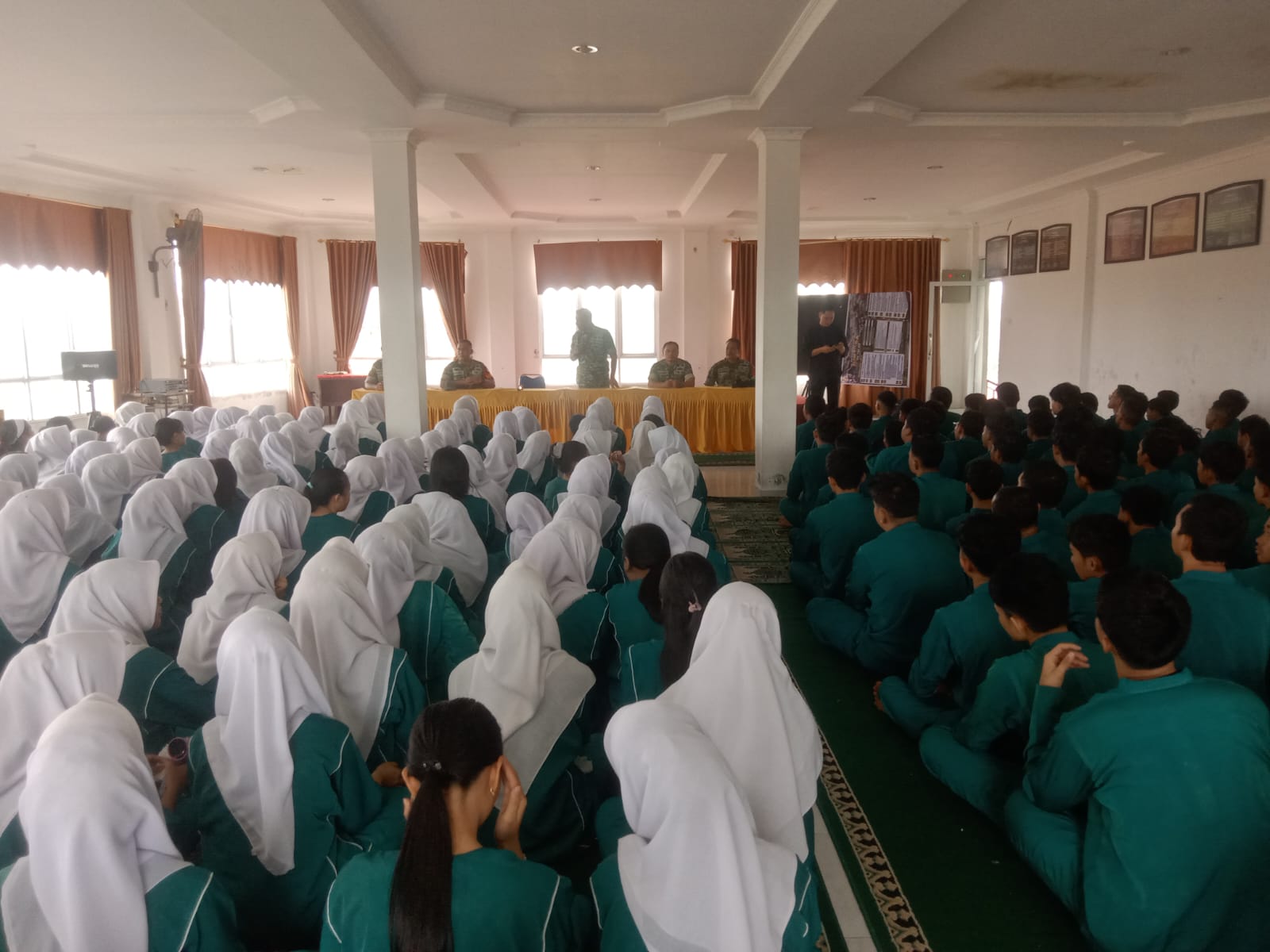 Rekrut Anggota TNI Babinsa Koramil 06 Siak Hulu Sosialisasikan Penerimaan Prajurit TNI AD