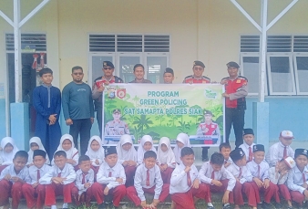 Green Policing Polres Siak Tanam Pohon di SDIT Muthamainnah, Tanamkan Cinta Lingkungan Sejak Dini 